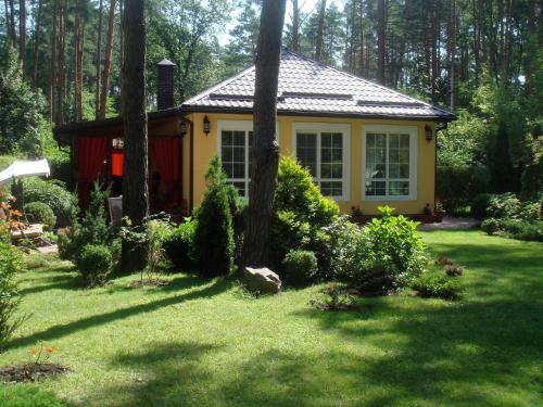 Фотография гостевого дома Домик в лесу