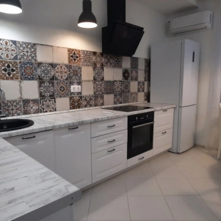 Фотография квартиры Квартира с зонированной гостиной и отдельной спальней