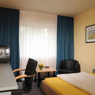 Фотографии гостиницы 
            Triton