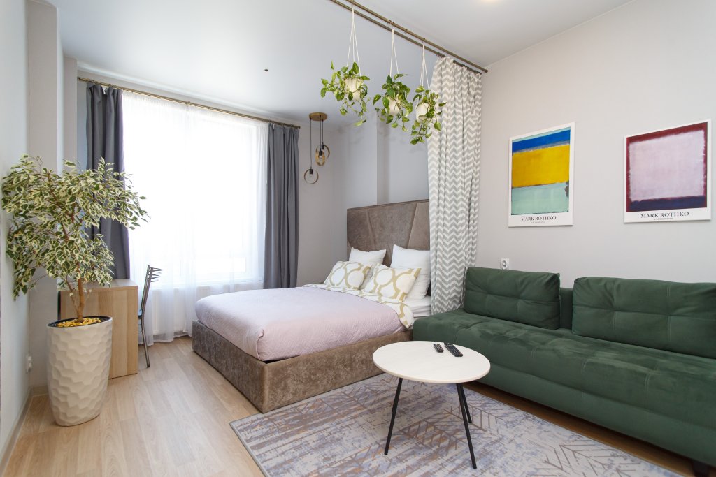 Фотография квартиры Апартаменты Green Tower — просторная студия в центре