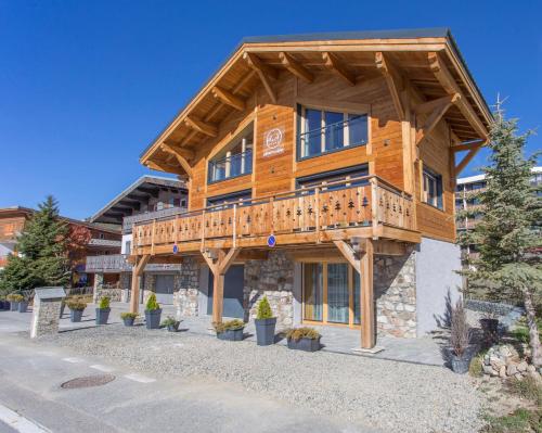 Фотографии гостевого дома 
            Chalet Secret de Neige Alpe-d'Huez
