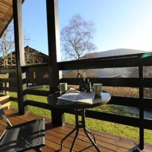 Фотографии гостевого дома 
            Cosy Modern Nordic Lodge w/ Loch View & Log Burner