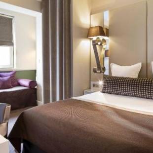 Фотографии гостиницы 
            Hôtel Galileo Champs Elysées