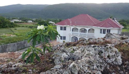 Фотография гостевого дома Eve's Rockaway Villa