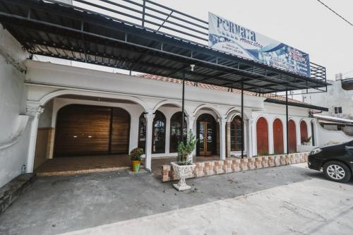 Фотография гостиницы RedDoorz near Mikie Holiday Funland Berastagi