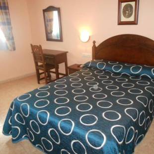 Фотографии гостевого дома 
            Hostal El Polígono