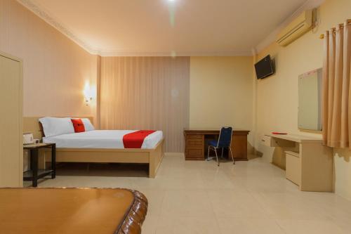 Фотография гостевого дома RedDoorz Plus near Pantai Malalayang Manado