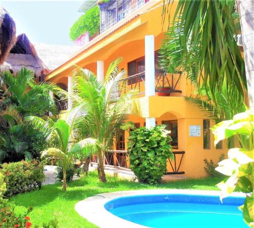 Фотография гостиницы Hotel Bosque Caribe, 5th Av. zone