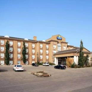 Фотографии гостиницы 
            Days Inn & Suites by Wyndham Strathmore