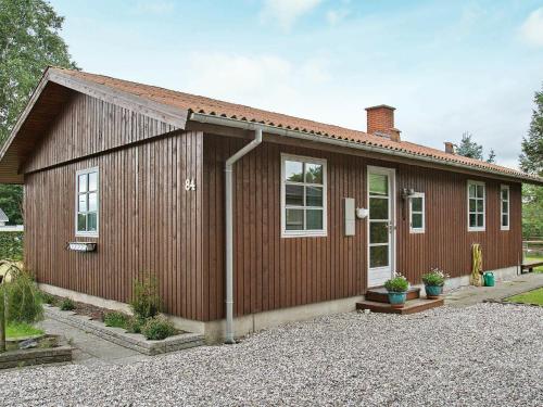 Фотография гостевого дома Four-Bedroom Holiday home in Grenaa