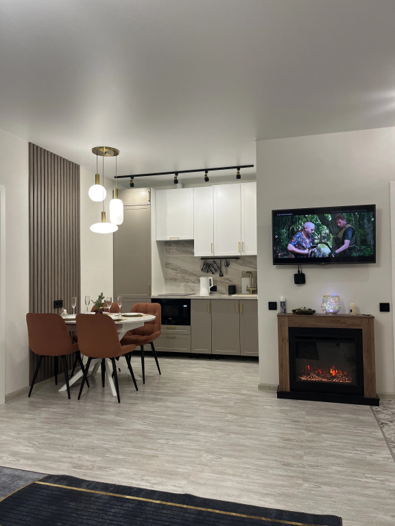 Фотография квартиры Квартира Парадайз LUX с камином в центре