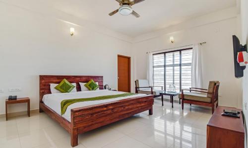 Фотография гостиницы Treebo Trend Vrindavan Coorg Somwarpet Road