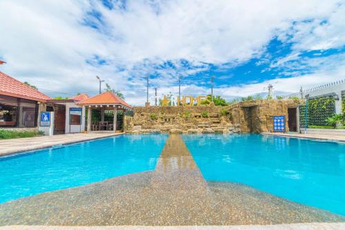 Фотография гостиницы RedDoorz Plus @ Starhomes Olivianville