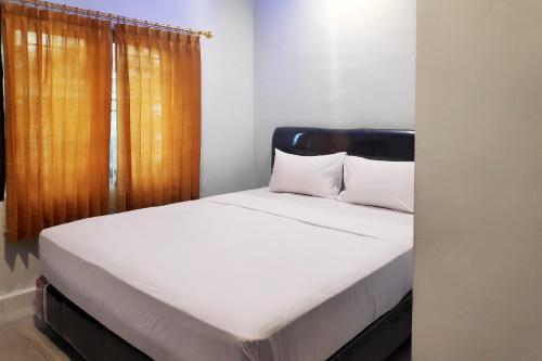 Фотография гостиницы OYO 3937 Teratai Guest House