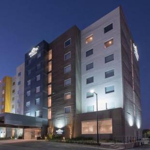 Фотографии гостиницы 
            Microtel Inn & Suites by Wyndham Irapuato