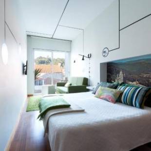 Фотографии гостевого дома 
            Pensao O Laranjeira