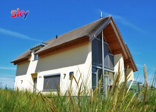 Фотография гостевого дома Ostsee - Reetdachhaus Nr 43 "Ostseestern" im Strand Resort