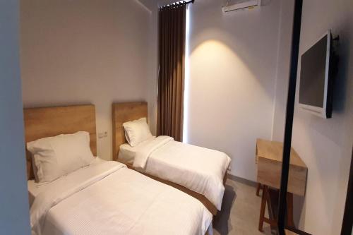 Фотография гостиницы Vaccinated Staff-OYO 2627 Ratamya Co-living