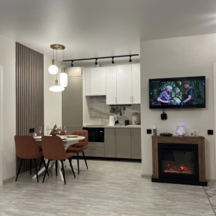 Фотография квартиры Квартира Парадайз LUX с камином в центре