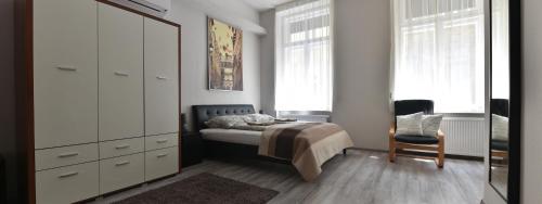 Фотография гостевого дома Corvin Point Rooms and Apartments