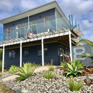 Фотографии гостевого дома 
            Oceans 8 - Mangawhai Heads Holiday Home