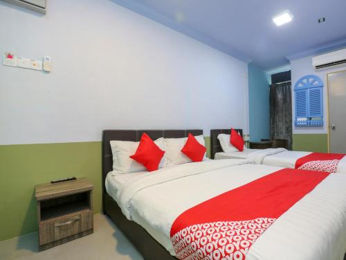 Фотографии гостиницы 
            OYO 90126 Pen U Cottages