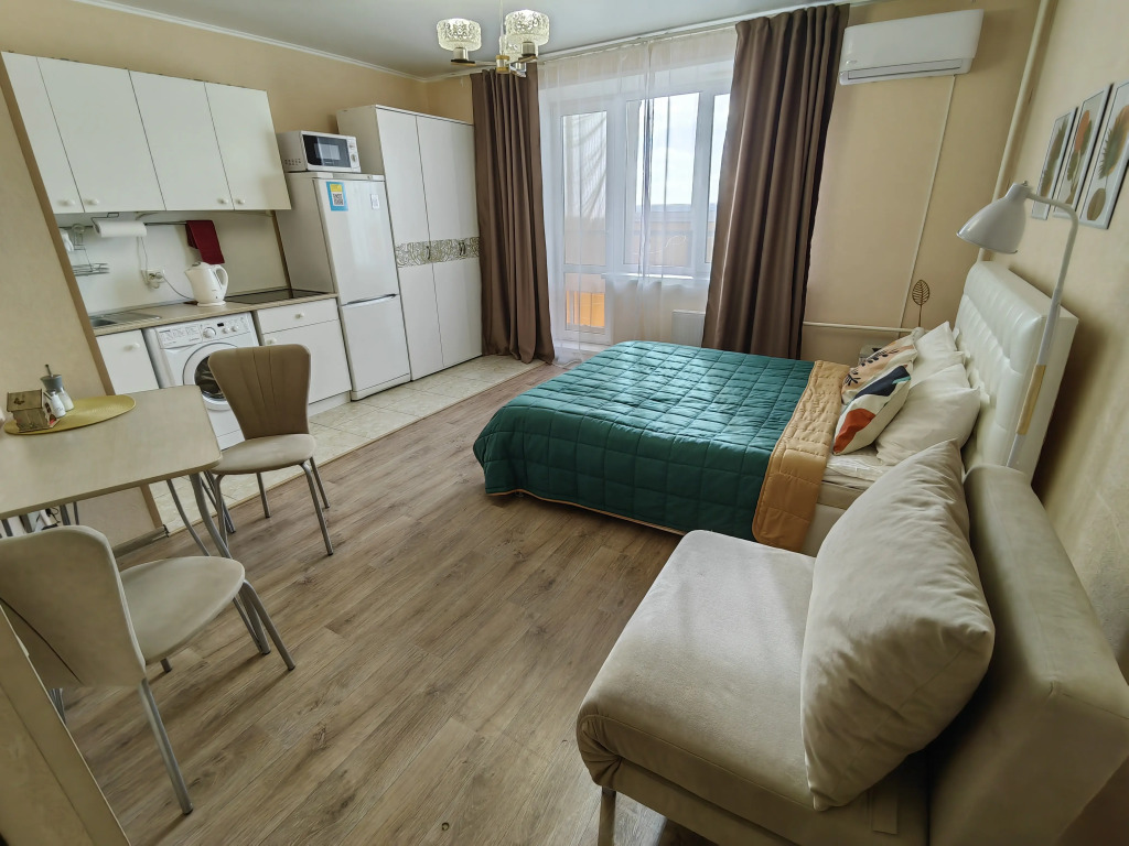 Фотография квартиры Квартира Уютная Студия в Академ Riverside