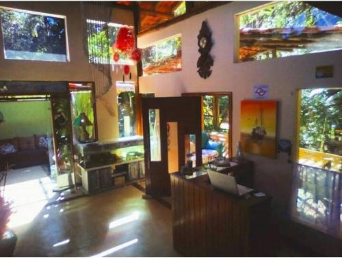 Фотография мини отеля Manacá Prumirim Suítes