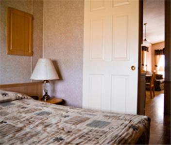 Фотография кемпинга Red Shoes RV Park and Chalets