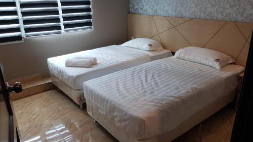 Фотография гостиницы OYO 89771 Dane & Shue