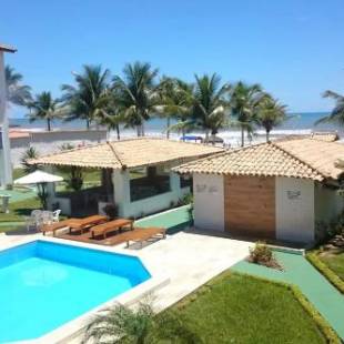 Фотографии гостевого дома 
            Triplex em Village - Frente ao Mar