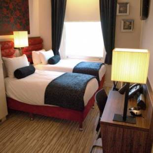 Фотографии гостиницы 
            Simply Rooms & Suites
