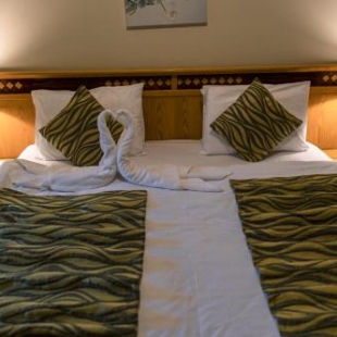 Фотография гостиницы Kindi Suite Hotel - فندق واجنحة الكندى