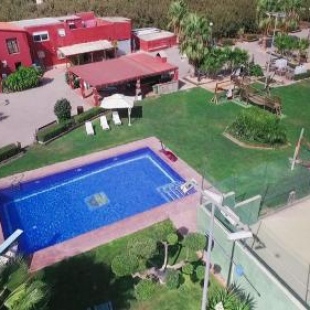 Фотография гостевого дома Villa de tres casas con padel y piscina