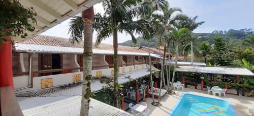 Фотографии гостиницы 
            Hotel Ferrugem Eco Village