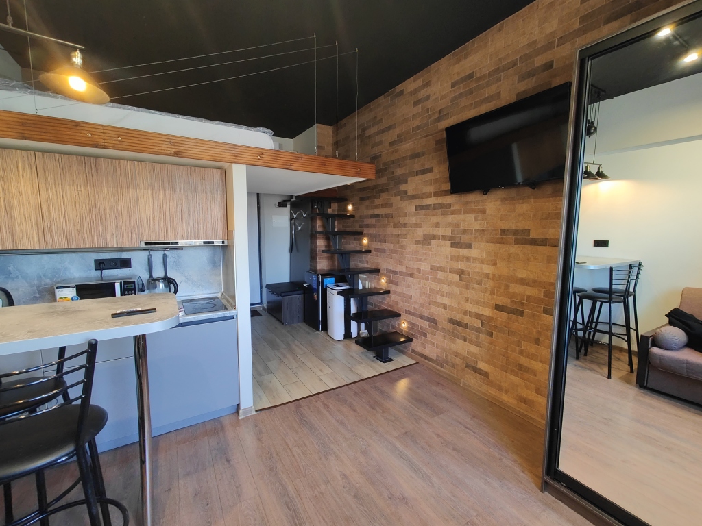 Фотография квартиры Апартаменты ZenApart Высокий Loft № 4