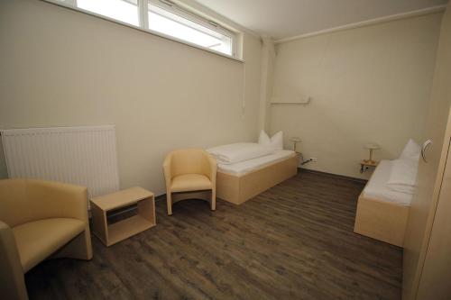 Фотография гостевого дома Kutterfisch Kajüten direkt im Stadthafen