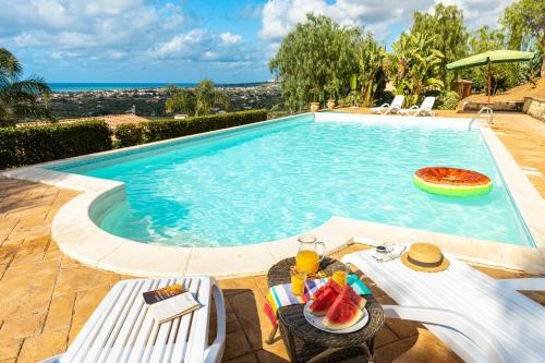 Фотография базы отдыха Solemar Sicilia - Casette Di Calzata