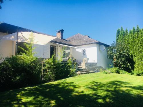 Фотография Коттеджа Suns, Villa Riva, Detached Villa, 1000 qm garden, mountain and river view, BBQ&bikes&sunbeds for free