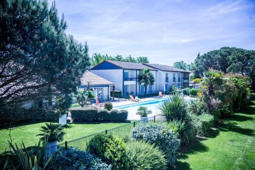 Фотография апарт отеля Hôtel Résidence Les Pins Galants