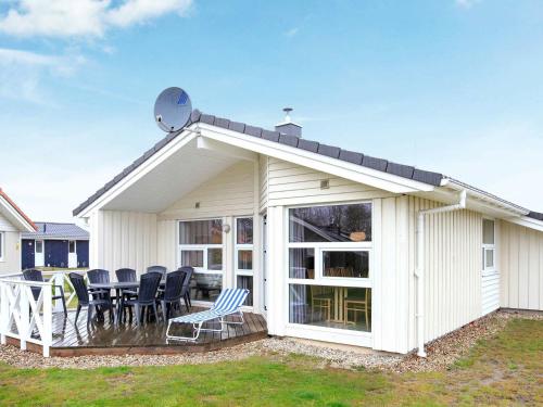 Фотография гостевого дома Three-Bedroom Holiday home in Grömitz 19