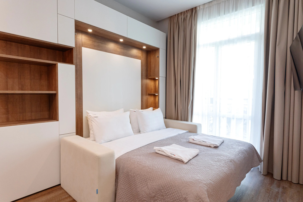 Фотография квартиры Апартаменты RED APARTMENTS Арт Лайт Сити апартамент Адамс