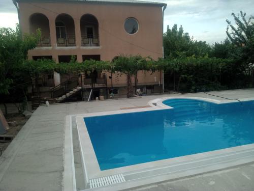 Фотография гостевого дома Villa with pool Saguramo garden