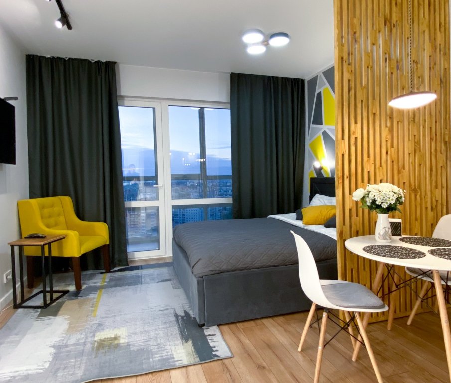 Фотография квартиры Апартаменты Желтая Студия с панорамным окном