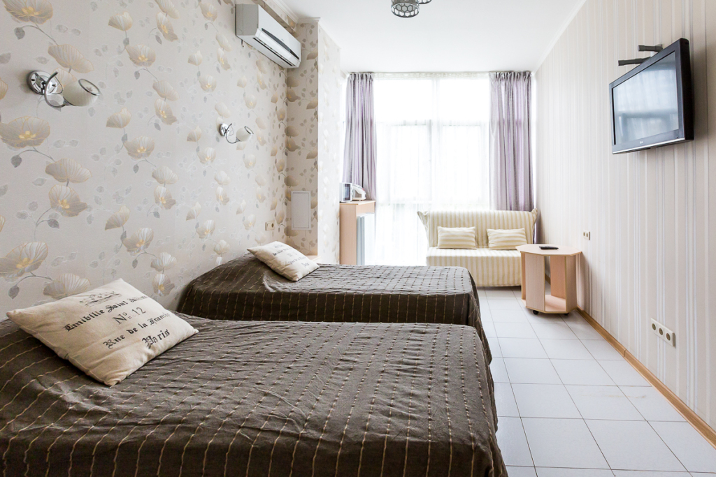 Фотография квартиры Апартаменты Светлана-Центр у моря с видом на сад магнолий