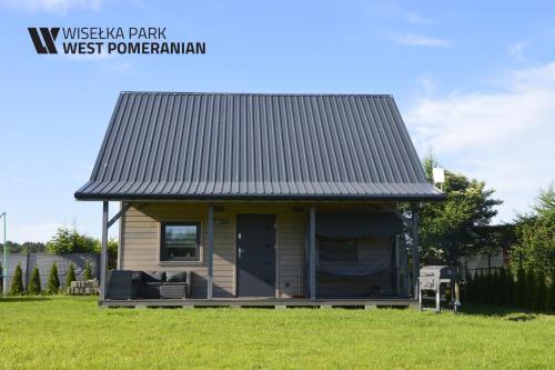 Фотографии гостевого дома 
            Wisełka Park - West Pomeranian