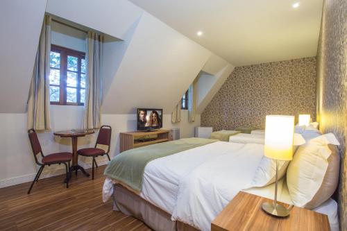 Фотография мини отеля Pousada La Toscana Campos do Jordão