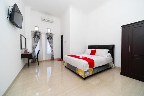 Фотография гостевого дома Reddoorz near Makassar Town Square 2