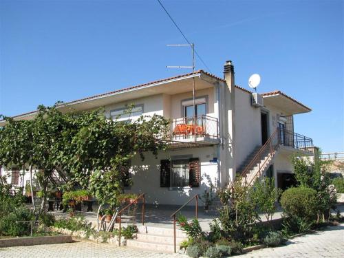 Фотография гостевого дома Apartments with a parking space Pirovac, Sibenik - 13263