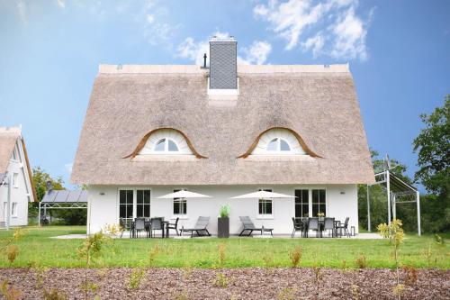 Фотографии гостевого дома 
            Reetidyll am Haff